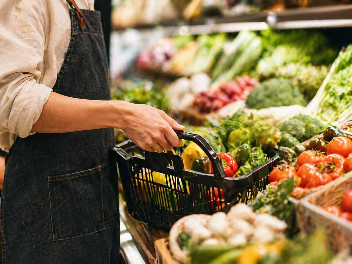 grocery store restocking produce